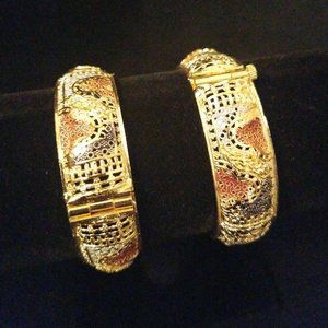 Bracelet gold, rose gold, black.  Intricate design